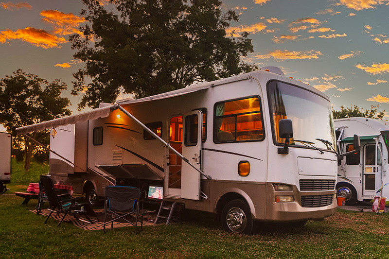 Photo of an RV at sunset