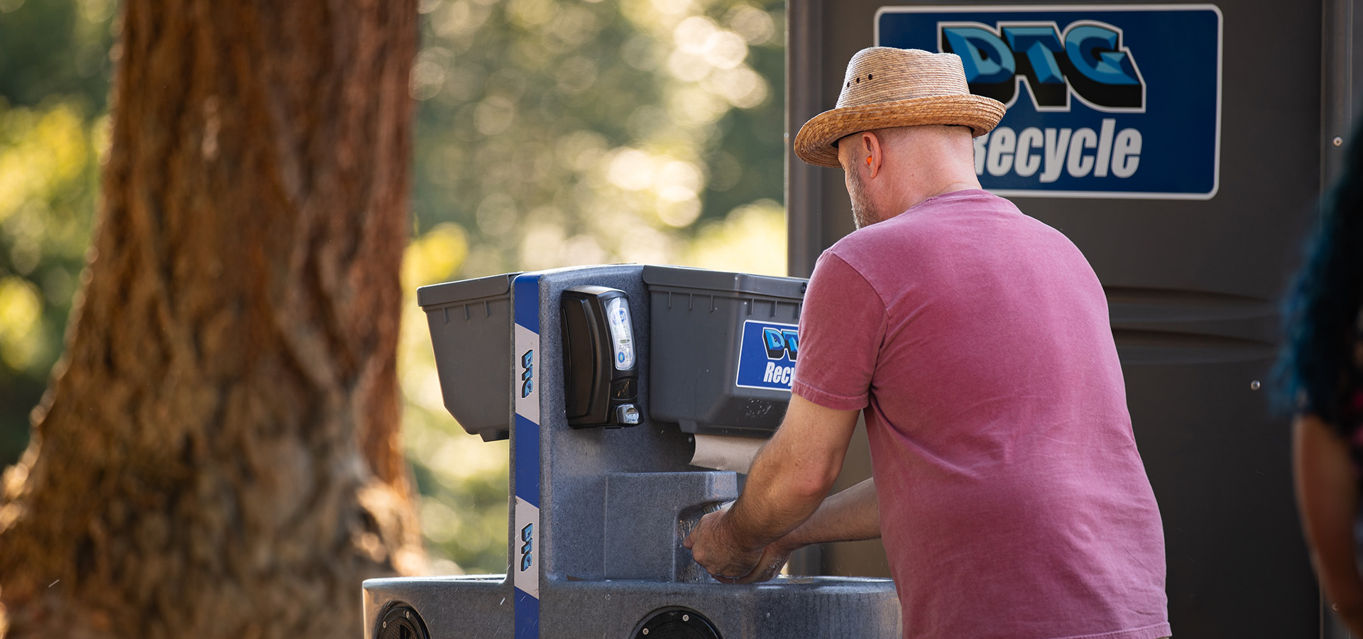 Man using a DTG portable sink